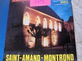 the front cover of a magazine with a picture of a church in the background