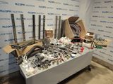 many different types of pipes and fittings on a table
