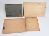 three old wooden boxes are sitting next to each other on a white surface