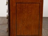 an image of a wooden cabinet with a marble top
