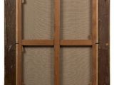 an old wooden frame with a window and a window screen on it