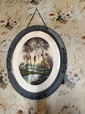 une photo d'un tableau accroché au mur