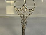 a pair of scissors that are sitting on a table