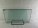 a glass table with a metal frame on it