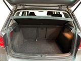 a trunk of a car with the back door open