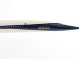 a model airplane that is flying in the sky