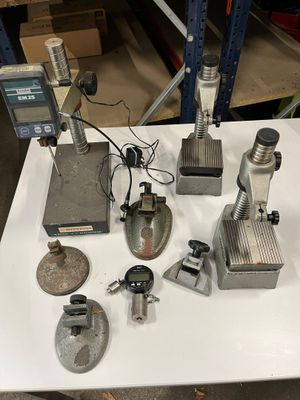 many different types of tools sitting on a table