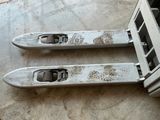 two skis that have been left on the ground