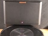 a turntable that is sitting on top of a wooden table