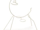 a white metal sculpture of a bird with a hat on it ' s head