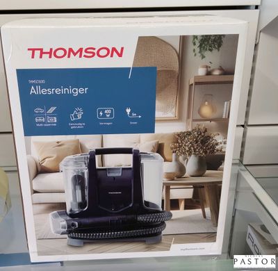 un carton contenant un aspirateur, exposé dans un magasin