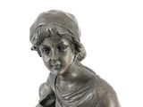 a statue of a boy with a skateboard on a white background