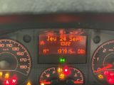 a close up of a dashboard of a car with a lot of gauges
