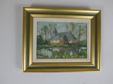 painting on the wall of a room with a picture of a house