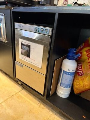 an image of a kitchen with stainless steel appliances and a microwave
