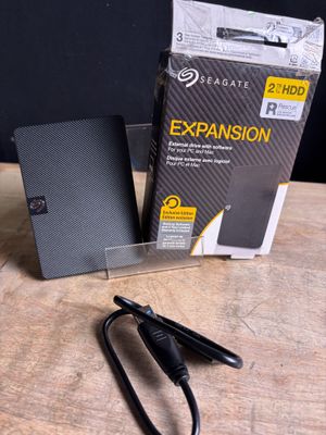 a box and a pair of scissors sitting on a table