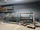 a large room with a lot of shelves and pallets in it