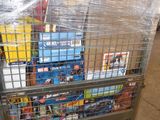 a cart full of toys in a warehouse with a plastic cover