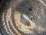 a close up of a metal pan with a dirty lid