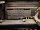 a close up of a car engine with a label on it