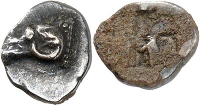 an image of a coin with a face on it and a coin with a face on it