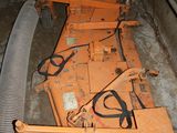 a machine that is sitting on the ground in the garage