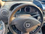 dashboard of a car with a steering wheel and dashboard controls