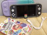 a nintendo wii game console next to a nintendo wii game console
