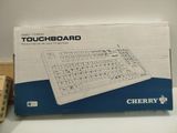 a box that has a keyboard in it on a table