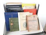 a lot of books in a box on a table