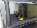 an image of a stainless steel microwave on a table