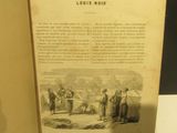un livre ouvert dans lequel on voit des gens