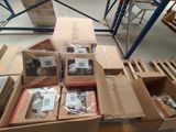 many boxes of electronic devices on a pallet in a warehouse