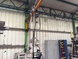 a picture of a garage with a refrigerator and a refrigerator freezer