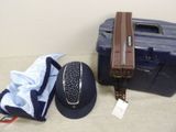 a hat, hat case, and a hat on the floor