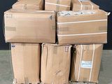 many boxes stacked on a pallet in a warehouse