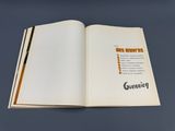 an open book that has a picture of a man on it