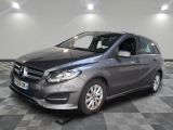 the mercedes b - class is parked on a checkered floor