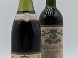 deux bouteilles de vin sont posées l'une à côté de l'autre sur une surface blanche