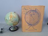 a cardboard box with a drawing of a globe on it