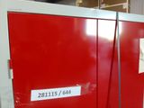 a red cabinet that has a price tag on it