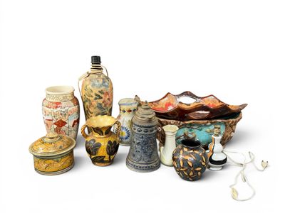 a lot of different vases that are sitting on a table