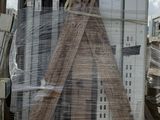 a view from a moving train window of a construction site