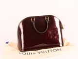 an image of a louis vuitton handbag on a cloth