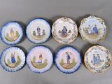 six plates with a picture of a man and a woman on them
