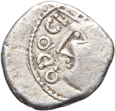 une pièce d'argent portant l'image d'un homme