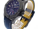 the watch is black and blue with a yellow band