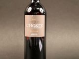 a bottle of wine that is sitting on a table