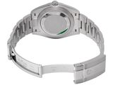 a close up of a watch on a white background with a white background