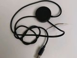 a black headphone with a cord attached to it